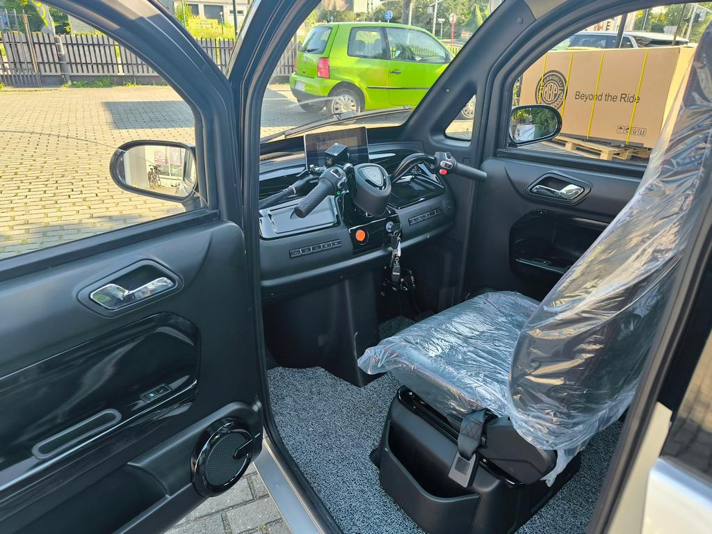 Motorower elektryczny trójkołowy zabudowany IML ARIEL 3000W na kat AM 2 os.